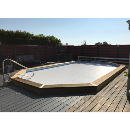 Volet roulant déplaçable pour piscine octogonale allongée 610x400cm 